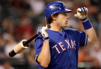 PHOENIX - JUNE 23:  Ian Kinsler #5 of the Texas Rangers waits to bat during the major league baseball game against the Arizona Diamondbacks at Chase Field on June 23, 2009 in Phoenix, Arizona. The Diamondbacks defeated the Rangers 8-2.  (Photo by Christian Petersen/Getty Images)