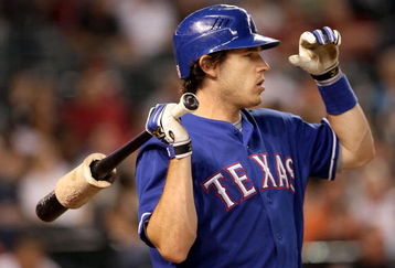 PHOENIX - JUNE 23:  Ian Kinsler #5 of the Texas Rangers waits to bat during the major league baseball game against the Arizona Diamondbacks at Chase Field on June 23, 2009 in Phoenix, Arizona. The Diamondbacks defeated the Rangers 8-2.  (Photo by Christian Petersen/Getty Images)