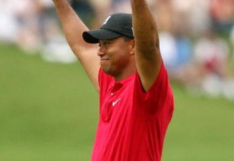 BETHESDA, MD - JULY 5 : Tiger Woods celebrates on the 18th hole after winning the the AT&T National hosted by Tiger Woods at Congressional Country Club on July 5, 2009 in Bethesda, Maryland. (Photo by Hunter Martin/Getty Images)