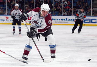 UNIONDALE, NY - MARCH 02:  Scott Hannan #22 of the Colorado Avalanche skates against the New York Islanders on March 2, 2009 at Nassau Coliseum in Uniondale, New York. The Isles defeated the Avalanche 4-2.  (Photo by Jim McIsaac/Getty Images)