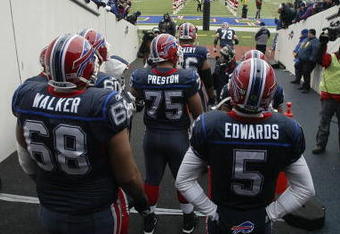 ORCHARD PARK, NY - DECEMBER 28:  Langston Walker #68, Duke Preston #75 and Trent Edwards #5 of the Buffalo Bills wait to walk on the field before the game against the New England Patriots on December 28, 2008 at Ralph Wilson Stadium in Orchard Park, New York. (Photo by Rick Stewart/Getty Images)