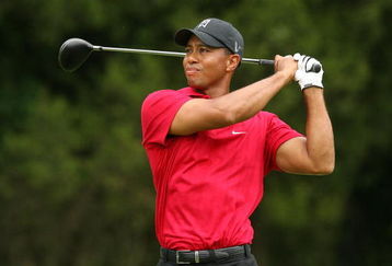 BETHESDA, MD - JULY 5 : Tiger Woods hits his tee shot on the sixth hole during the final round of the AT&T National hosted by Tiger Woods at Congressional Country Club on July 5, 2009 in Bethesda, Maryland. (Photo by Hunter Martin/Getty Images)