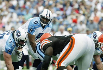NASHVILLE, TN - SEPTEMBER 22:  Quarterback Steve McNair #9 of the Tennessee Titans crouches over center Gennaro DiNapoli #64 during the NFL game against the Cleveland Browns on September 22, 2002 at The Coliseum in Nashville, Tennessee.  The Browns won 31-28 in ovetime.  (Photo by Craig Jones/Getty Images)