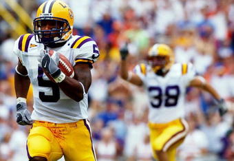 BATON ROUGE, LA - OCTOBER 11: Andre Caldwell of the Louisiana State University Tigers runs for a touchdown in the first quarter against the Florida Gators on October 11, 2003 at the Tiger Stadium in Baton Rouge, Louisiana.  (Photo by Chris Graythen/Getty Images) 