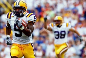 BATON ROUGE, LA - OCTOBER 11: Andre Caldwell of the Louisiana State University Tigers runs for a touchdown in the first quarter against the Florida Gators on October 11, 2003 at the Tiger Stadium in Baton Rouge, Louisiana.  (Photo by Chris Graythen/Getty Images) 
