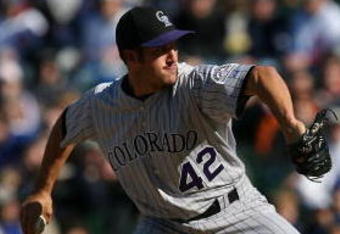 CHICAGO - APRIL 15: Huston Street of the Colorado Rockies, wearing a #42 jersey on Jackie Robinson Day, throws the ball against the Chicago Cubs on April 15, 2009 at Wrigley Field in Chicago, Illinois. The Rockies defeated the Cubs 5-2. (Photo by Jonathan Daniel/Getty Images)