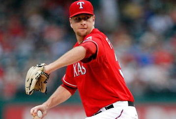 ARLINGTON, TX - JUNE 30:  Pitcher Scott Feldman #39 of the Texas Rangers throws against the Los Angeles Angels of Anaheim on June 30, 2009 at Rangers Ballpark in Arlington, Texas.  (Photo by Ronald Martinez/Getty Images)