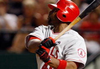 ARLINGTON, TX - JULY 1:  Torii Hunter #48 of the Los Angeles Angels of Anaheim hits a two-run double against the Texas Rangers in the seventh inning at Rangers Ballpark July 1, 2009 in Arlington, Texas.  (Photo by Ronald Martinez/Getty Images)