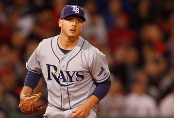 BOSTON - APRIL 8: Scott Kazmir #19 of the Tampa Bay Rays watches the flight of a hit ball against the Boston Red Sox at Fenway Park, April 8, 2009, in Boston, Massachusetts. (Photo by Jim Rogash/Getty Images)