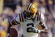 BATON ROUGE, LA - OCTOBER 25:  Demetrius Byrd #2 of the LSU Tigers runs for a first down in the first half of their football game against the Georgia Bulldogs at Tiger Stadium on October 25, 2008 in Baton Rouge, Louisiana.  (Photo by Dave Martin/Getty Images)