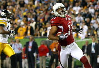 TAMPA, FL - FEBRUARY 01:  Larry Fitzgerald #11 of the Arizona Cardinals celebrates after scoring on a 64-yard touchdown reception in the fourth quarter against the Pittsburgh Steelers during Super Bowl XLIII on February 1, 2009 at Raymond James Stadium in Tampa, Florida. Steelers won 27-23. (Photo by Al Bello/Getty Images)