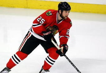 CHICAGO - MAY 07:  Cam Barker #25 of the Chicago Blackhawks skates against the Vancouver Canucks during Game Four of the Western Conference Semifinal Round of the 2009 Stanley Cup Playoffs on May 7, 2009 at the United Center in Chicago, Illinois.  (Photo by Jonathan Daniel/Getty Images)
