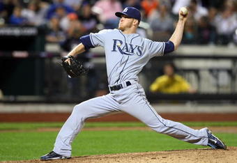 NEW YORK - JUNE 19:  J.P. Howell #39 of the Tampa Bay Rays throws a pitch against the New York Mets on June 19, 2009 at Citi Field in the Flushing neighborhood of the Queens borough of New York City.  (Photo by Jim McIsaac/Getty Images)