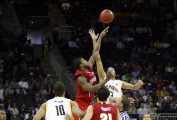 KANSAS CITY, MO - MARCH 19:  Jordan Wilkes #33 of the California Golden Bears takes the opening game tip-off against Landon Milbourne #1 of the Maryland Terrapins during the first round of the NCAA Division I Men's Basketball Tournament at the Sprint Center on March 19, 2009 in Kansas City, Missouri.  (Photo by Jamie Squire/Getty Images)