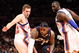 NEW YORK - FEBRUARY 04:  LeBron James #23 of the Cleveland Cavaliers dribbles past David Lee #42 and Tim Thomas #2 of the New York Knicks on February 4, 2009 at Madison Square Garden in New York City. NOTE TO USER: User expressly acknowledges and agrees that, by downloading and or using this photograph, User is consenting to the terms and conditions of the Getty Images License Agreement.  (Photo by Nick Laham/Getty Images)