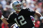 OAKLAND, CA - SEPTEMBER 19:  Rich Gannon #12 of the Oakland Raiders throws a pass against the Buffalo Bills at Network Associates Coliseum on September 19, 2004 in Oakland, California. (Photo by Jed Jacobsohn/Getty Images)