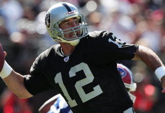 OAKLAND, CA - SEPTEMBER 19:  Rich Gannon #12 of the Oakland Raiders throws a pass against the Buffalo Bills at Network Associates Coliseum on September 19, 2004 in Oakland, California. (Photo by Jed Jacobsohn/Getty Images)