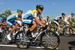 LA GRANDE MOTTE, FRANCE - JULY 06:  Lance Armstrong (R) of USA and team Astana on his way flanked by his teammate Alberto Contador (L) of Spain during stage three of the 2009 Tour de France from Marseille to La Grande Motte on July 6, 2009 in La Grande-Motte, France. The stage was won by Mark Cavendish of Great Britain and Team Columbia.  (Photo by Jasper Juinen/Getty Images)