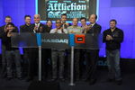 NEW YORK - JANUARY 20:  MMA fighter and former UFC light heavyweight champion Tito Ortiz, VP, Affliction Entertainment Tom Atencio, Fedor Vladimirovich Emelianenko, heavyweight mixed martial artist and current World Alliance of Mixed Martial Arts heavyweight champion and their guests ring the NASDAQ opening bell at NASDAQ in Times Square on January 20, 2009 in New York City.  (Photo by Joe Corrigan/Getty Images)