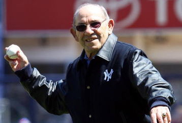 NEW YORK - APRIL 16: Yogi Berra throws the ceremonial first pitch before the opening day game between the Cleveland Indians and the New York Yankees at the new Yankee Stadium on April 16, 2009 in the Bronx borough of New York City. This is the first regular season MLB game being played at the new venue which replaced the old Yankee Stadium as the Yankees home field. (Photo by Jim McIsaac/Getty Images) 