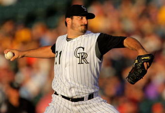 DENVER - JULY 06:  Starting pitcher Jason Marquis #21 of the Colorado Rockies delivers against the Washington Nationals during MLB action at Coors Field on July 6, 2009 in Denver, Colorado. Marquis earned the win as the Rockies defeated the Nationals 1-0.  (Photo by Doug Pensinger/Getty Images)