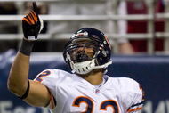 ST. LOUIS, MO - NOVEMBER 23:  Matt Forte #22 of the Chicago Bears celebrates a touchdown against the St. Louis Rams at the Edward Jones Dome on November 23, 2008 in St. Louis, Missouri.  The Bears beat the Rams 27-3.  (Photo by Dilip Vishwanat/Getty Images)