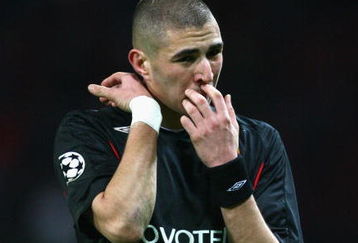 MANCHESTER, UNITED KINGDOM - MARCH 04:  Karim Benzema of Lyon shows his dejection at the end of the UEFA Champions League first knockout round second leg match between Manchester United and Lyon at Old Trafford on March 4, 2008 in Manchester, England.  (Photo by Alex Livesey/Getty Images)