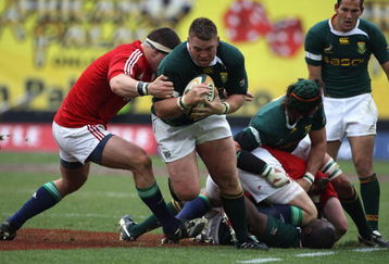 JOHANNESBURG, SOUTH AFRICA - JULY 04:  Jon Smit, the South African captain charges upfield during the Third Test match between South African and the British and Irish Lions at Ellis Park Stadium on July 4, 2009 in Johannesburg, South Africa. (Photo by David Rogers/Getty Images)