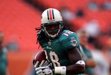 MIAMI - AUGUST 09:  Wide receiver Ernest Wilford #18 of the Miami Dolphins warms up prior to a pre season game against the Tampa Bay Buccaneers on August 9, 2008 at Dolphin Stadium in Miami, Florida. Tampa defeated Miami 17-6.  (Photo by Marc Serota/Getty Images)