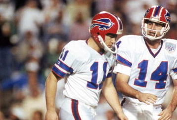TAMPA, FL - JANUARY 27:  Kicker Scott Norwood #11 and  quarterback Frank Reich #14 of the Buffalo Bills walk n the field during Super Bowl XXV against the New York Giants at Tampa Stadium on January 27, 1991 in Tampa, Florida.  The Giants won 20-19.  (Photo by George Rose/Getty Images)