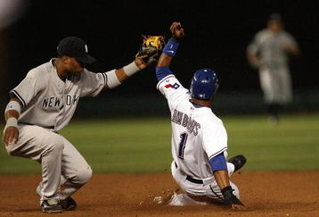 ARLINGTON, TX - MAY 27:  Second baseman Robinson Cano #24 of the New York Yankees makes the out on Elvis Andrus #1 of the Texas Rangers on May 27, 2009 at Rangers Ballpark in Arlington, Texas.  (Photo by Ronald Martinez/Getty Images)