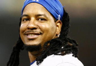 SAN DIEGO - JULY 3:  Manny Ramirez #99 of the Los Angeles Dodgers smiles against the San Diego Padres during the game on July 3, 2009 at Petco Park in San Diego, California. (Photo by Jeff Gross/Getty Images)