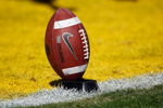 BATON ROUGE, LA - NOVEMBER 08:  Detail view of the football as kicker Josh Jasper #30 of the Louisiana State University Tigers warms up before the game against the Alabama Crimson Tide on November 11, 2008 at Tiger Stadium in Baton Rouge, Louisiana.  (Photo by Chris Graythen/Getty Images)