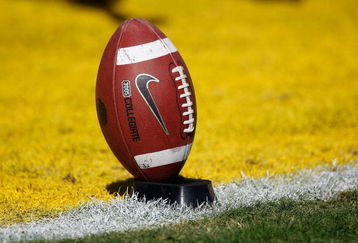 BATON ROUGE, LA - NOVEMBER 08:  Detail view of the football as kicker Josh Jasper #30 of the Louisiana State University Tigers warms up before the game against the Alabama Crimson Tide on November 11, 2008 at Tiger Stadium in Baton Rouge, Louisiana.  (Photo by Chris Graythen/Getty Images)