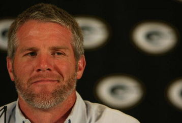 GREEN BAY, WI - MARCH 6: Quarterback Brett Favre of the Green Bay Packers announces his retirement at a press conference at Lambeau Field March 6, 2008 in Green Bay, Wisconsin. (Photo by Jonathan Daniel/Getty Images)