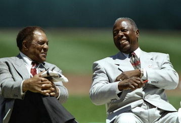 7 Jun 1997:  Willie Mays (l) speaks with Hank Aaron during a game between the San Francisco Giants and the Atlanta Braves at 3Com Park in San Francisco, California.  The Braves won the game 5-2. Mandatory Credit: Todd Warshaw  /Allsport