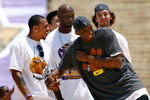 LOS ANGELES, CA - JUNE 17:  (L-R) Shannon Brown, Lamar Odom, Kobe Bryant and Pau Gasol of the Los Angeles Lakers celebrate on stage during the 2009 NBA Championship Victory Parade at the Los Angeles Memorial Coliseum on June 17, 2009 in Los Angeles, California.  (Photo by Jeff Gross/Getty Images)