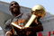 LOS ANGELES, CA - JUNE 17:  Kobe Bryant #24 holds the Larry O'Brien trophy as he rides on the top of a double decker bus at the start of the Los Angeles Lakers NBA championship victory parade outside the Staples Center on June 17, 2009 in Los Angeles, California.  (Photo by Stephen Dunn/Getty Images)