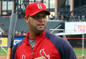 NEW YORK - JUNE 22:  Albert Pujols #5 of the St. Louis Cardinals looks on during batting practice before playing the New York Mets on June 22, 2009 at Citi Field in the Flushing neighborhood of the Queens borough of New York City.  (Photo by Jim McIsaac/Getty Images)