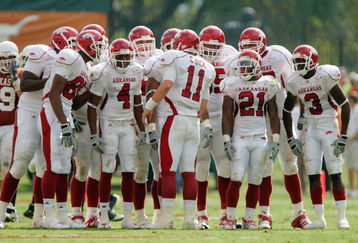 AUSTIN, TX - SEPTEMBER 27:  Quarterback Casey Dick #11 of the Arkansas Razorbacks leads the huddle during the game against the Texas Longhorns on September 27, 2008 at Darrell K Royal-Texas Memorial Stadium in Austin, Texas.  Texas won 52-10.  (Photo by Brian Bahr/Getty Images)