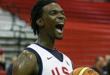 LAS VEGAS - JULY 21:  Chris Bosh #12 of the USA Basketball Men's Senior National Team reacts during a practice at Valley High School June 21, 2008 in Las Vegas, Nevada.  (Photo by Ethan Miller/Getty Images)