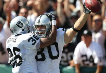 OAKLAND, CA - SEPTEMBER 28:   Zach Miller #80 of the Oakland Raiders celebrates with Justin Griffith #36 after scoring a touchdown against the San Diego Chargers during an NFL game on September 28, 2008 at McAfee Coliseum in Oakland, California.  (Photo by Jed Jacobsohn/Getty Images)