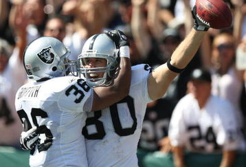 OAKLAND, CA - SEPTEMBER 28:   Zach Miller #80 of the Oakland Raiders celebrates with Justin Griffith #36 after scoring a touchdown against the San Diego Chargers during an NFL game on September 28, 2008 at McAfee Coliseum in Oakland, California.  (Photo by Jed Jacobsohn/Getty Images)