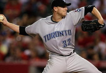 ANAHEIM, CA - MAY 6:  Roy Halladay #32 of the Toronto Blue Jays throws a pitch against the Los Angeles Angels of Anaheim at Angel Stadium May 6, 2009 in Anaheim, California.  (Photo by Stephen Dunn/Getty Images)