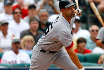 ATLANTA - JUNE 27:  Mike Lowell #25 of the Boston Red Sox grounds out against the Atlanta Braves at Turner Field on June 27, 2009 in Atlanta, Georgia.  (Photo by Kevin C. Cox/Getty Images)