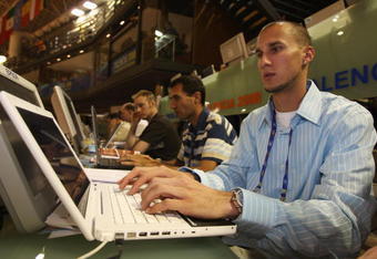VALENCIA, SPAIN - MARCH 07:  Jeremy Wariner, CEO of AF, takes part in an internet blog during the 12th IAAF World Indoor Championships at the Palau Lluis Puig on March 7, 2008 in Valencia, Spain.  (Photo by Stu Forster/Getty Images)