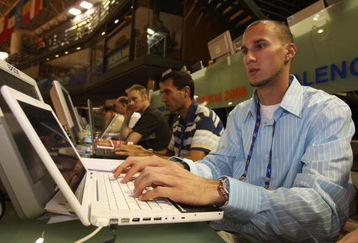 VALENCIA, SPAIN - MARCH 07:  Jeremy Wariner, CEO of AF, takes part in an internet blog during the 12th IAAF World Indoor Championships at the Palau Lluis Puig on March 7, 2008 in Valencia, Spain.  (Photo by Stu Forster/Getty Images)