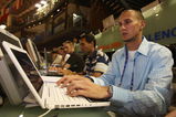 VALENCIA, SPAIN - MARCH 07:  Jeremy Wariner, CEO of AF, takes part in an internet blog during the 12th IAAF World Indoor Championships at the Palau Lluis Puig on March 7, 2008 in Valencia, Spain.  (Photo by Stu Forster/Getty Images)