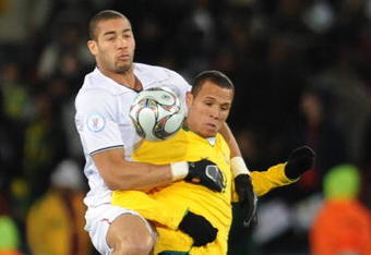 JOHANNESBURG, SOUTH AFRICA - JUNE 28: Oguchi Onyewu and Luis Fabiano compete during the 2009 Confederations Cup final match between Brazil and USA from Ellis Park on June 28, 2009 in Johannesburg, South Africa. (Photo by Lefty Shivambu/Gallo Images/Getty Images)