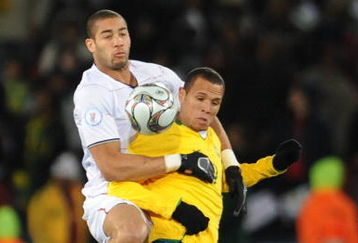 JOHANNESBURG, SOUTH AFRICA - JUNE 28: Oguchi Onyewu and Luis Fabiano compete during the 2009 Confederations Cup final match between Brazil and USA from Ellis Park on June 28, 2009 in Johannesburg, South Africa. (Photo by Lefty Shivambu/Gallo Images/Getty Images)